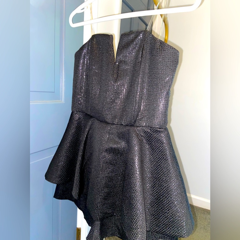 Black, sparkly romper from Vestique